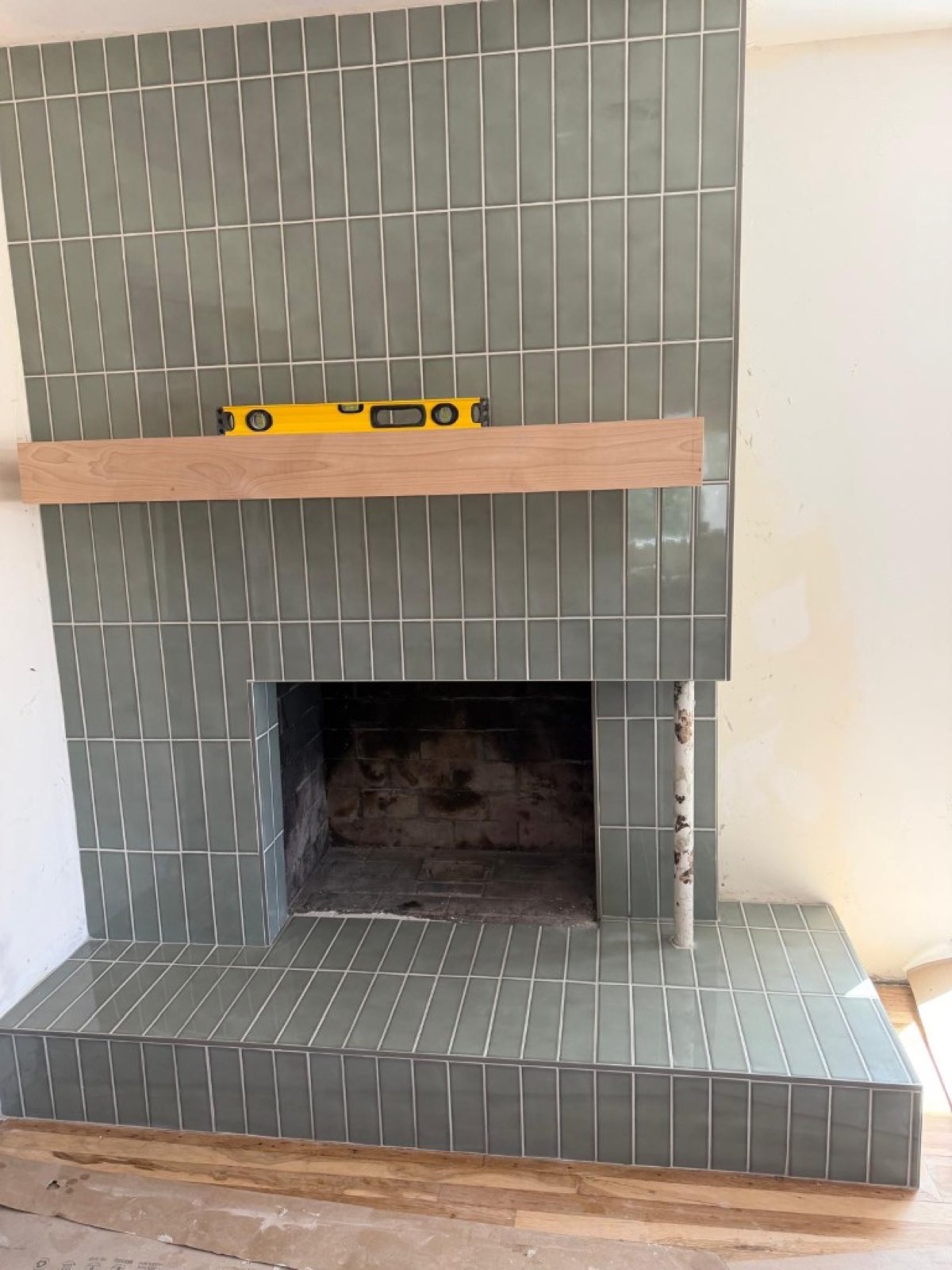 Green tile on the fireplace