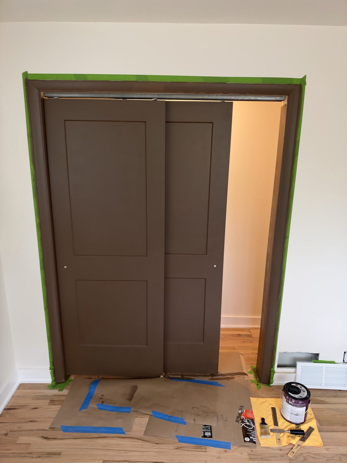 Sep 29, 2026. Empty closet interior with one brown sliding door open