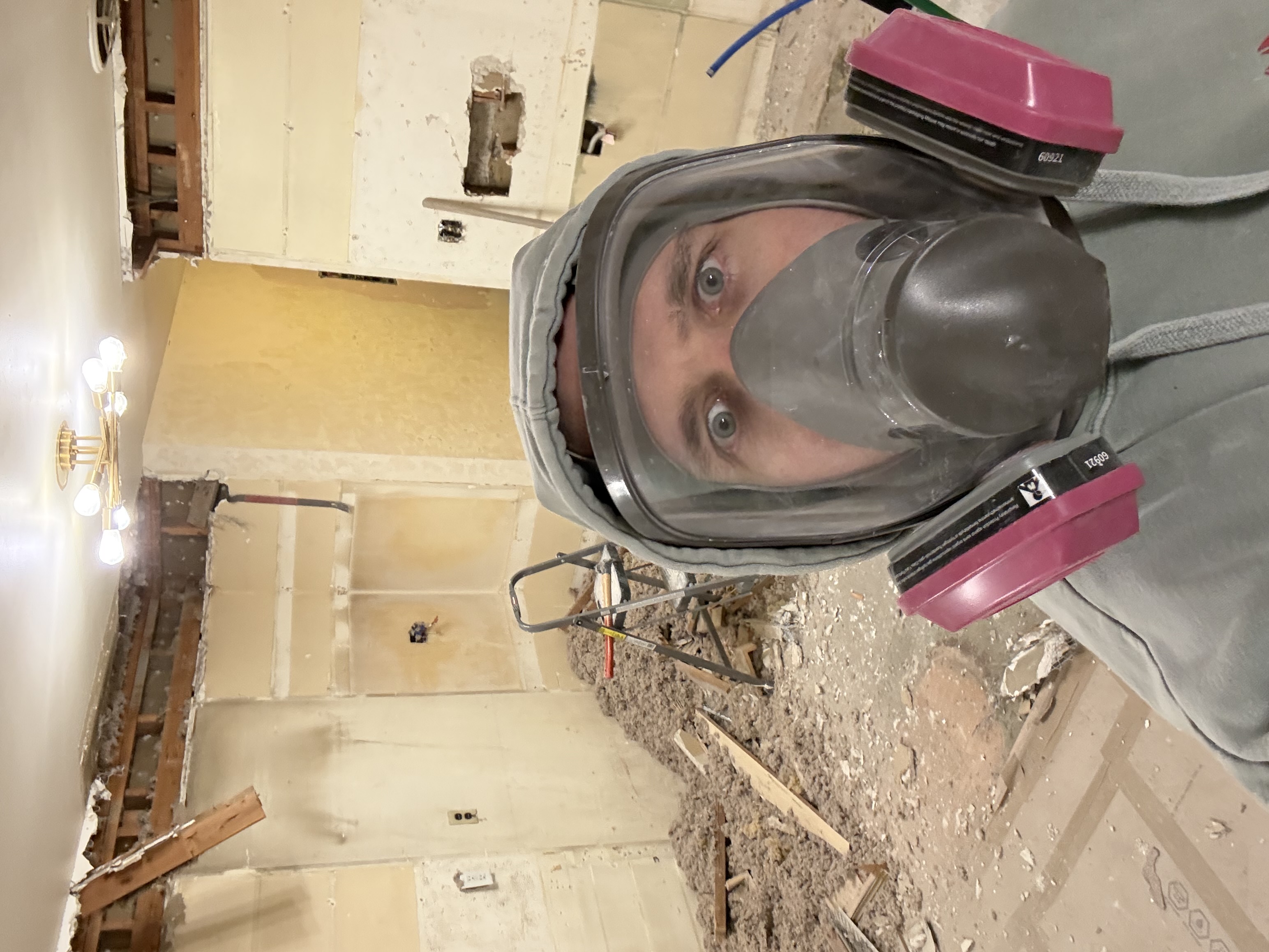 Full respirator during soffit demo