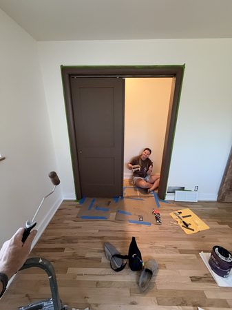 Sep 27, 2026. Painting the brown doors, with the doorway taped off