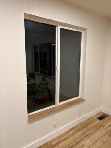Sep 2, 2026 — Another view of the wood window sill and white baseboard trim