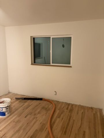 Sep 2, 2026 — Room with freshly painted walls, a wood window sill, and hardwood flooring