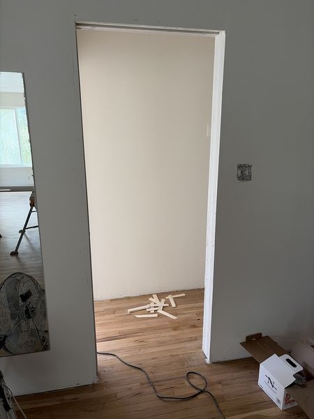 Aug 24, 2026 — Doorway with white-painted jambs and exposed hardwood floor