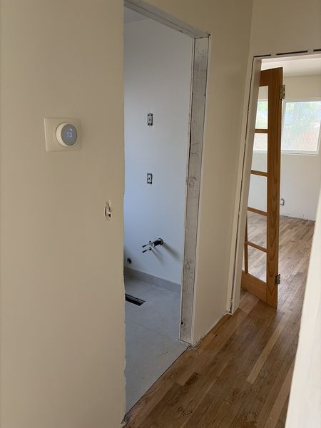 Aug 24, 2026 — Hallway looking into the bathroom and an adjacent room