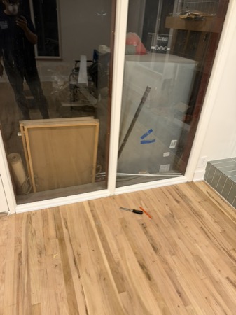 Sep 21, 2026 — White trim installed along the sliding glass door and hardwood floor