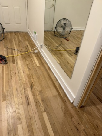 Sep 21, 2026 — Entry wall and full-height mirror with newly installed baseboard