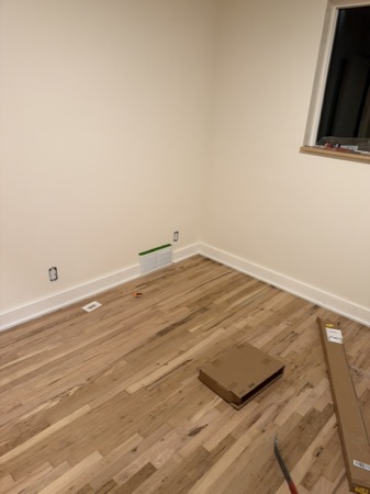 Sep 21, 2026 — Bedroom with completed baseboard runs and outlet covers still being installed